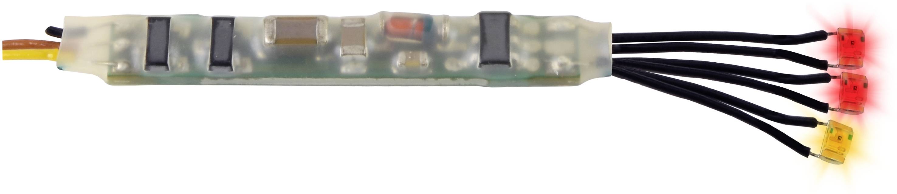An electronic device with several black switches and cables, with red lights illuminating at its end.