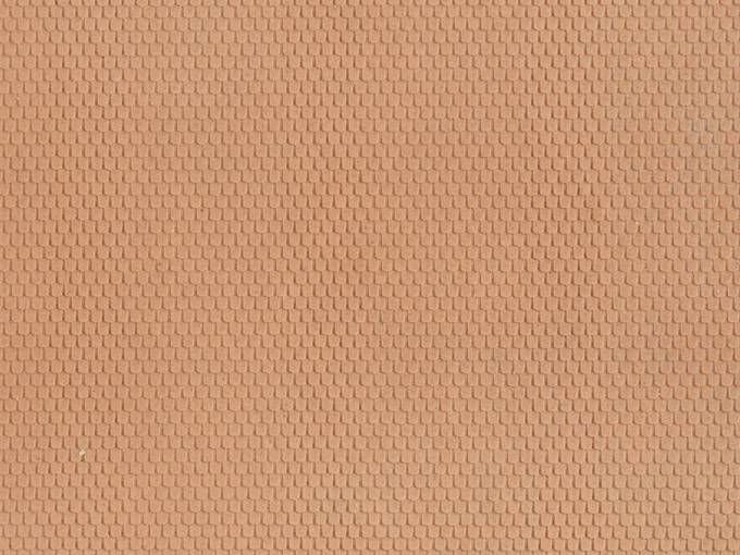 Orange-coloured, structured surface with uniform, tiny honeycomb pattern.