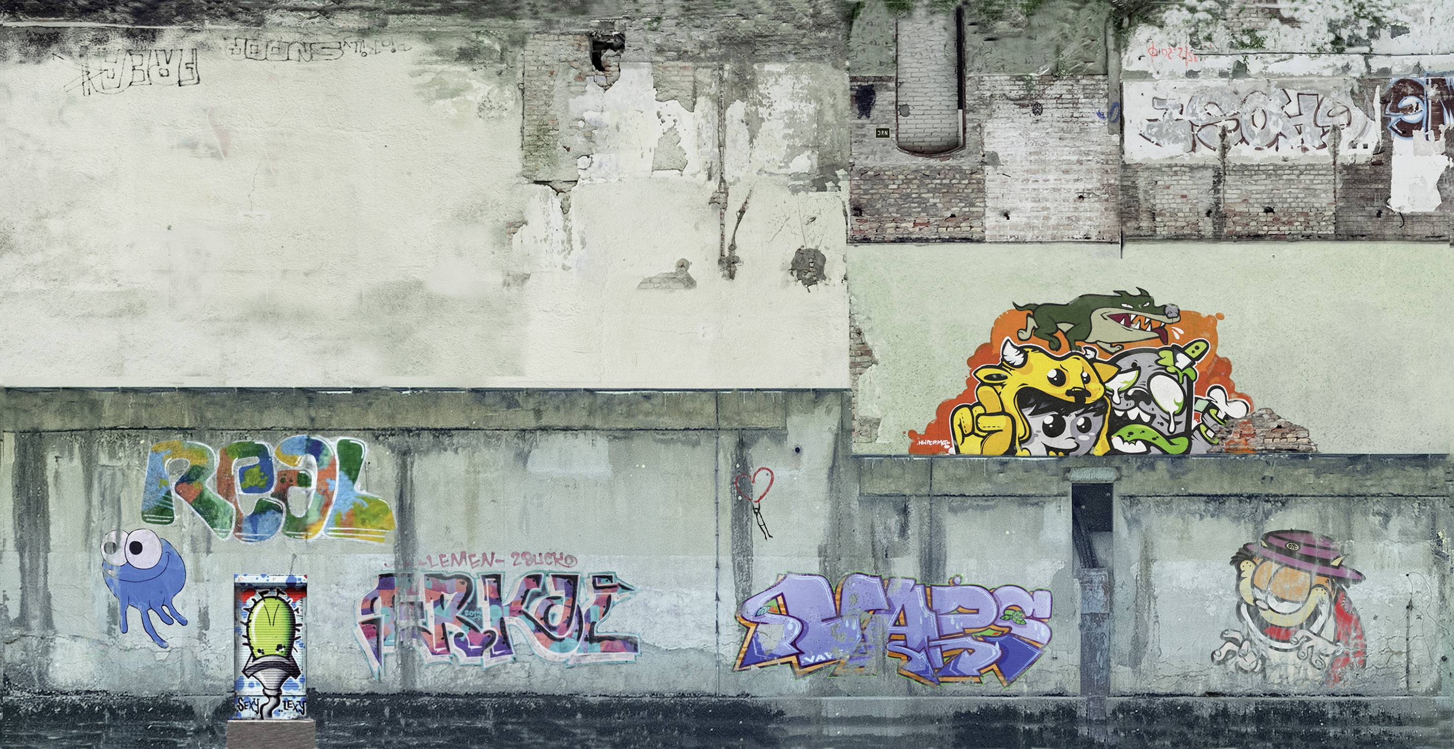A concrete wall with graffiti in various colours and styles, including colourful letters, a blue octopus, and cartoon-like figures.