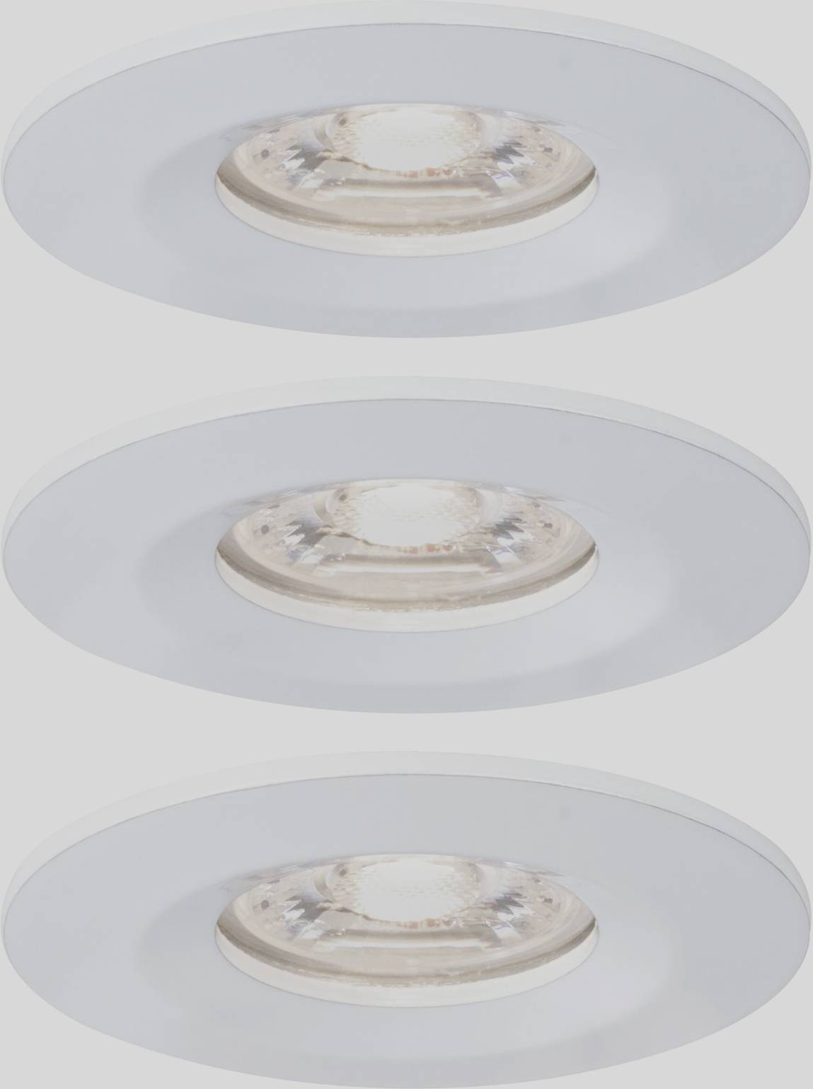 Three round, white recessed ceiling lights in a row, evenly spaced.