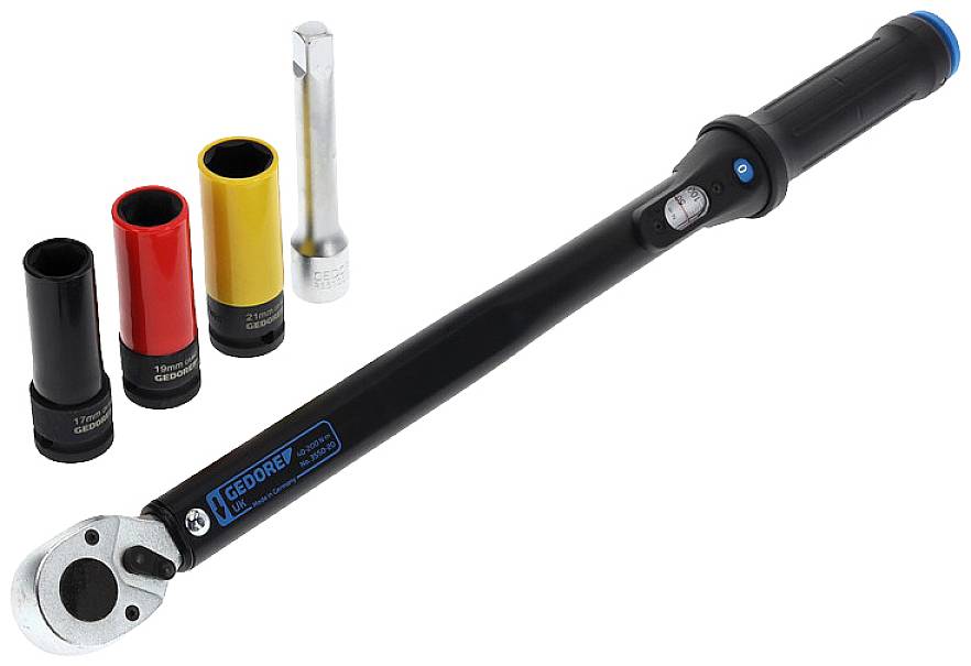 Torque wrench with three coloured socket keys and an extension. The socket keys are black, red and yellow.