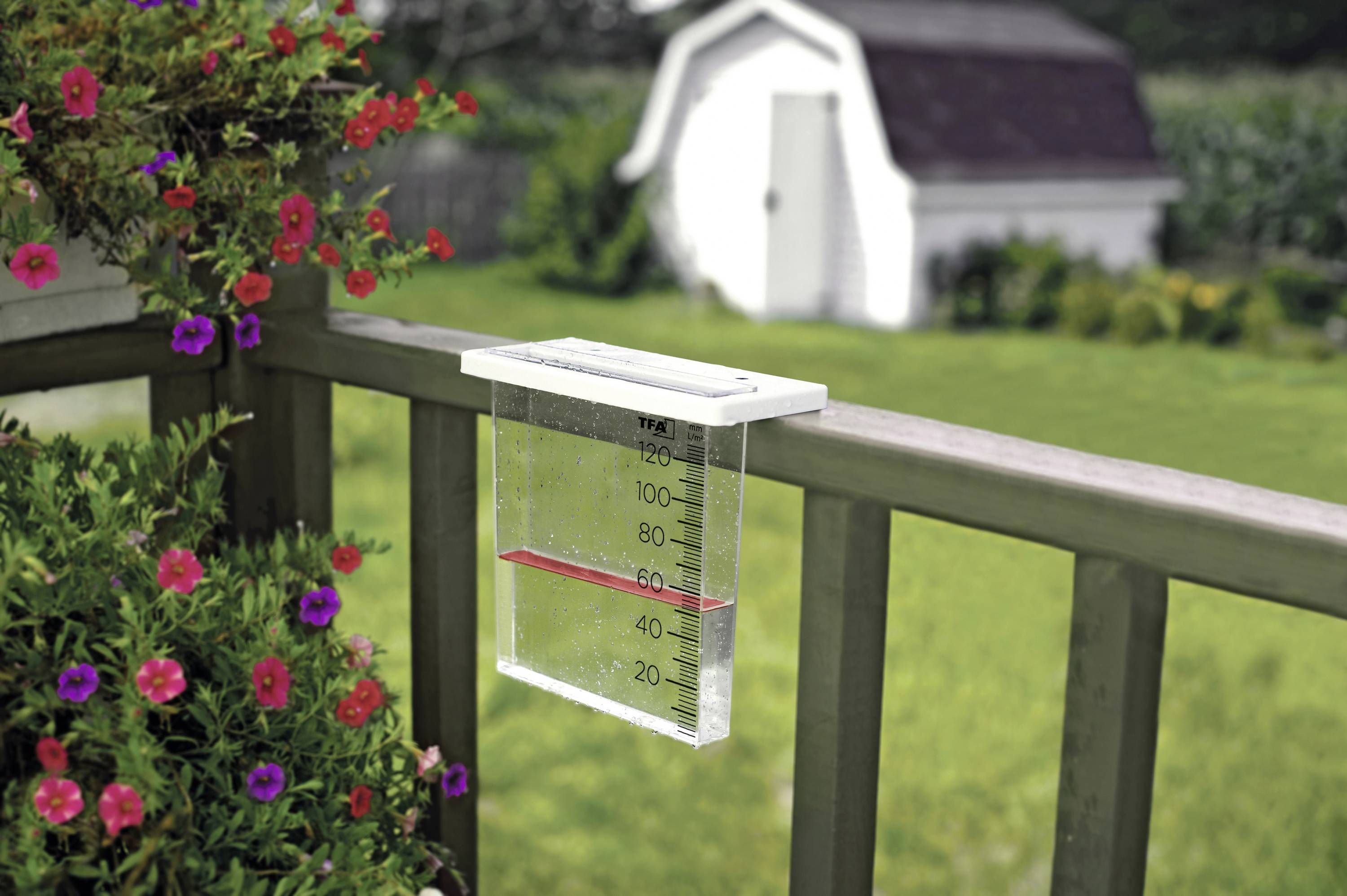 'Analogue Rain Gauge' shows a transparent plastic container with a scale for measuring precipitation. A red float marks the water level. Includes mounting instructions.
