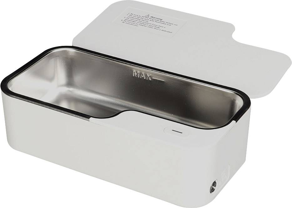 An open, white device with a stainless steel interior, likely a UV disinfection container, used for cleaning objects.