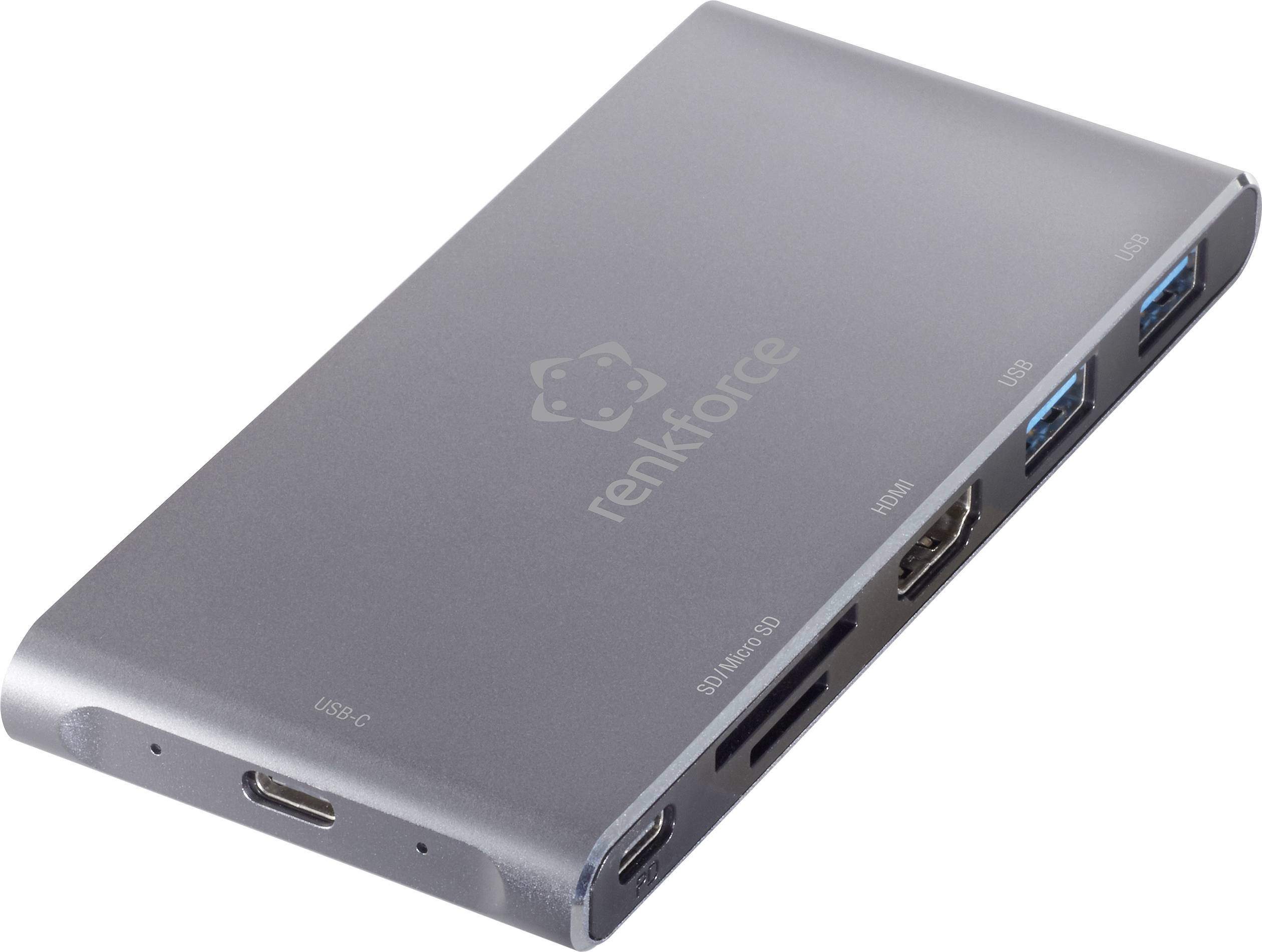 A USB-C hub in grey with multiple ports, including an SD card slot, USB-A, HDMI, and USB-C.