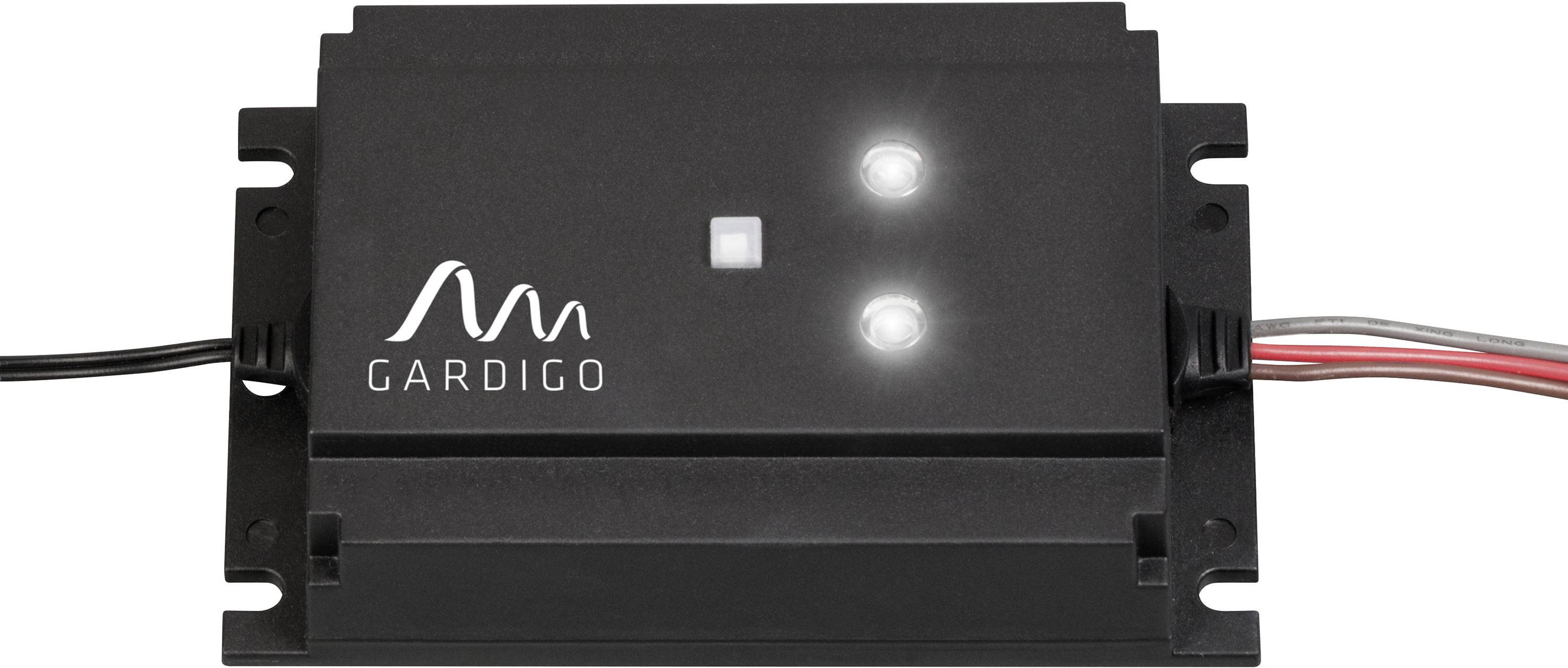 Electronic device with two illuminated LEDs, black casing, and cable connections. Marked with a logo and the name 'GARDIGO'.