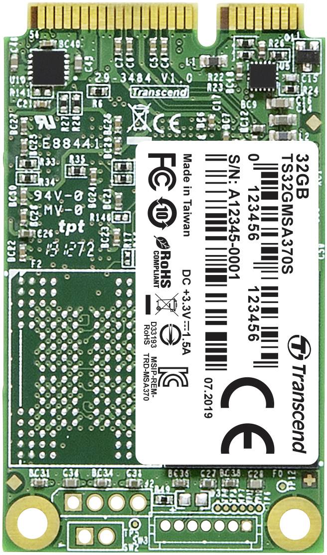 A Transcend mSATA SSD with 32 GB capacity, showing serial number and manufacturer details. Primarily green circuit board visible.