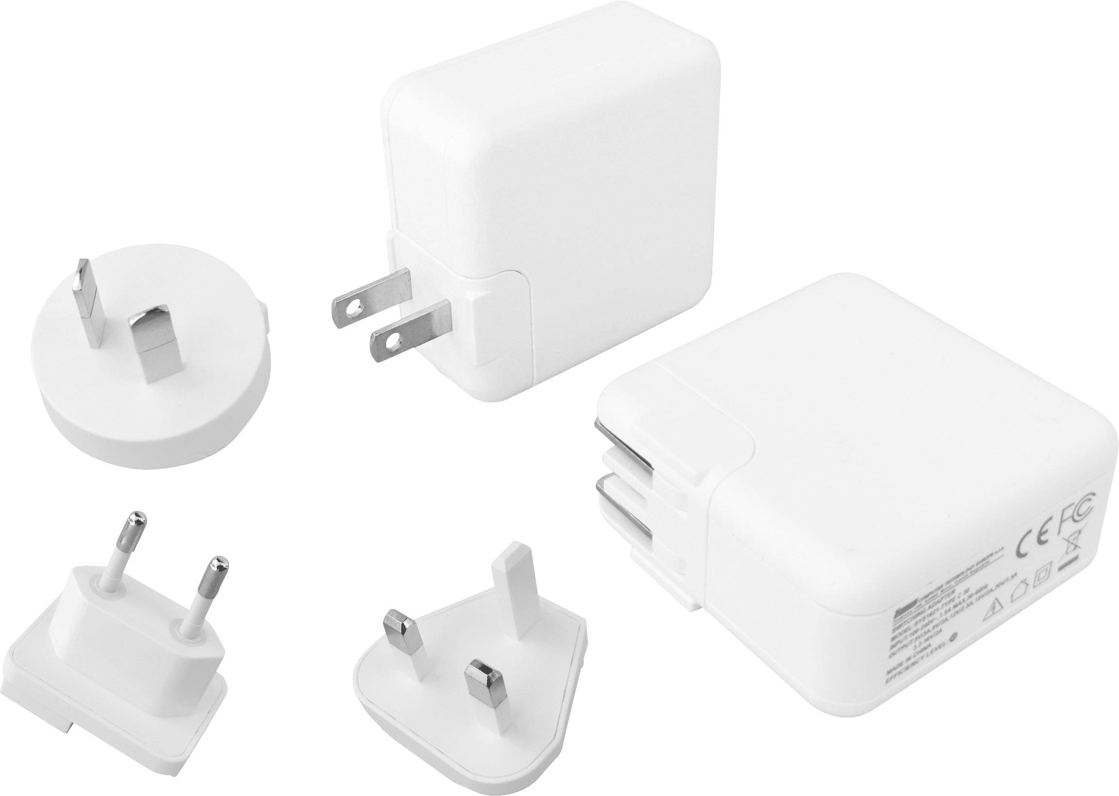 White laptop power adapters with plugs for various international socket standards, including USA, EU and UK.