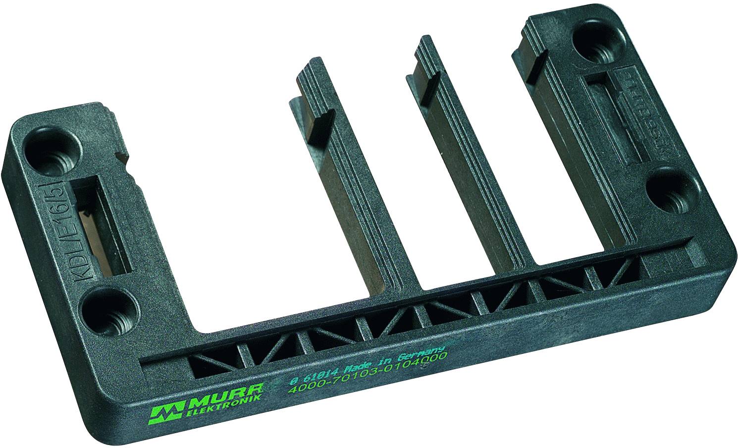A black plastic component with the inscription 'Murrelektronik' and a serial number. It has multiple slots and holes.
