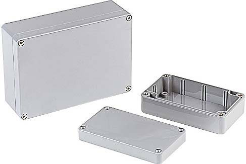 Three grey aluminium enclosures in various sizes; one standing, another open, and the third lying flat.