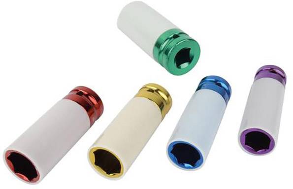 Five puzzle nuts with colour-coded rings: red, green, yellow, blue and purple. They are different sizes.