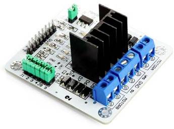 Printed circuit board with electronic components, including green and blue terminal blocks, and black heatsinks for heat dissipation.