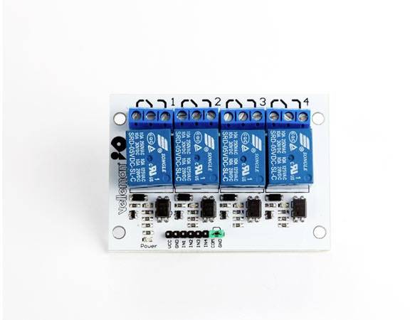 Relay module with four blue relays on a white circuit board, numbered 1 to 4. LED indicator and terminal strip along the bottom edge.