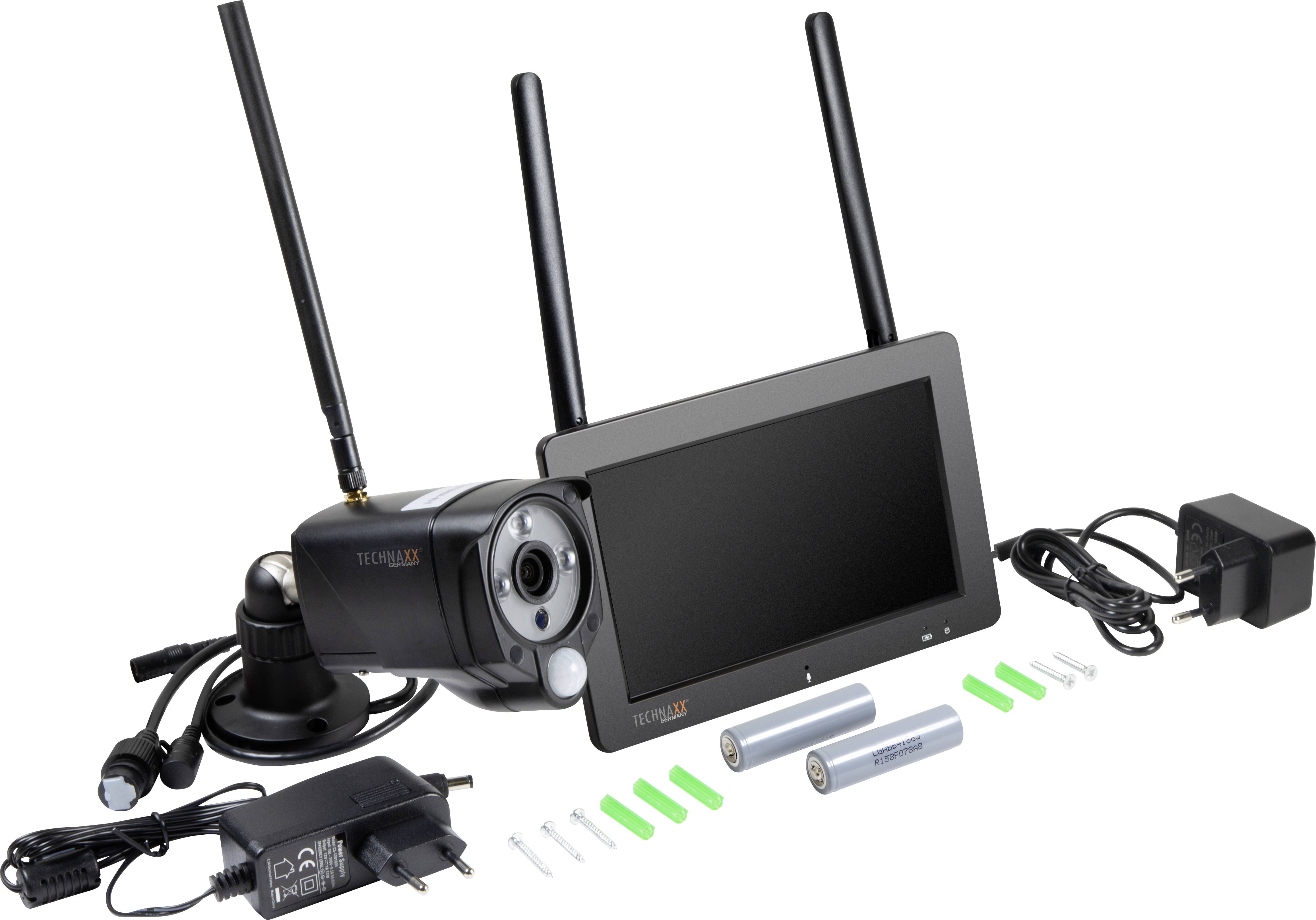 Surveillance Camera Kit with camera, two antennas, monitor, power adapter and batteries. Suitable for home security monitoring.
