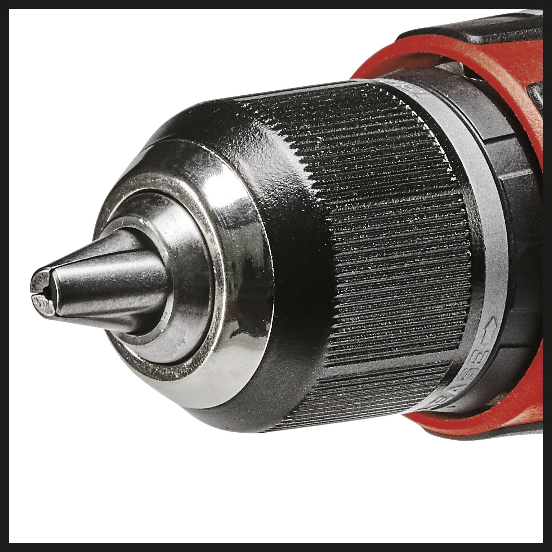 Close-up of a black cordless drill's chuck with red accents, showing metallic details and robust construction.