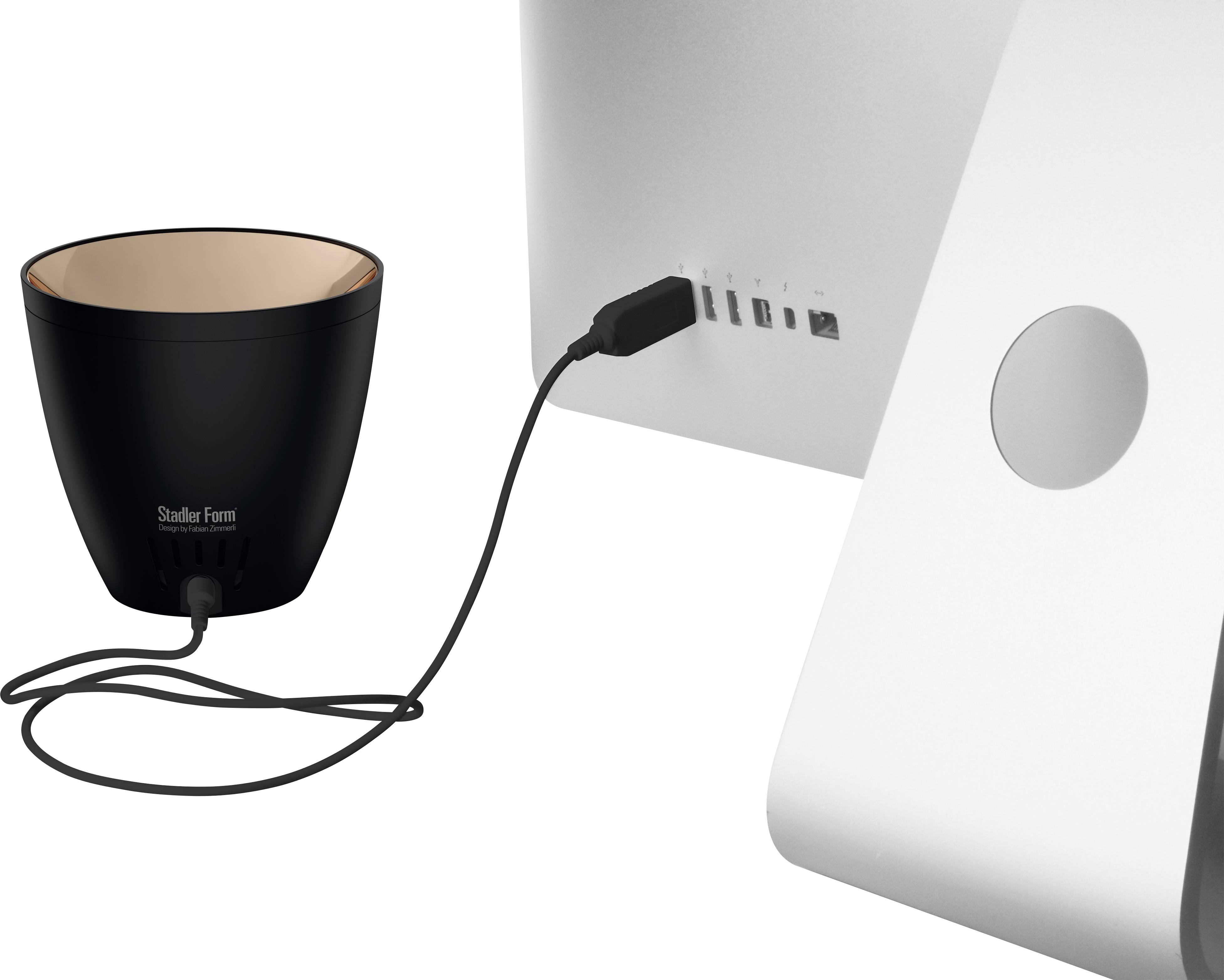 A black plant pot connected to a computer, presumably for plant monitoring via a special cable system.