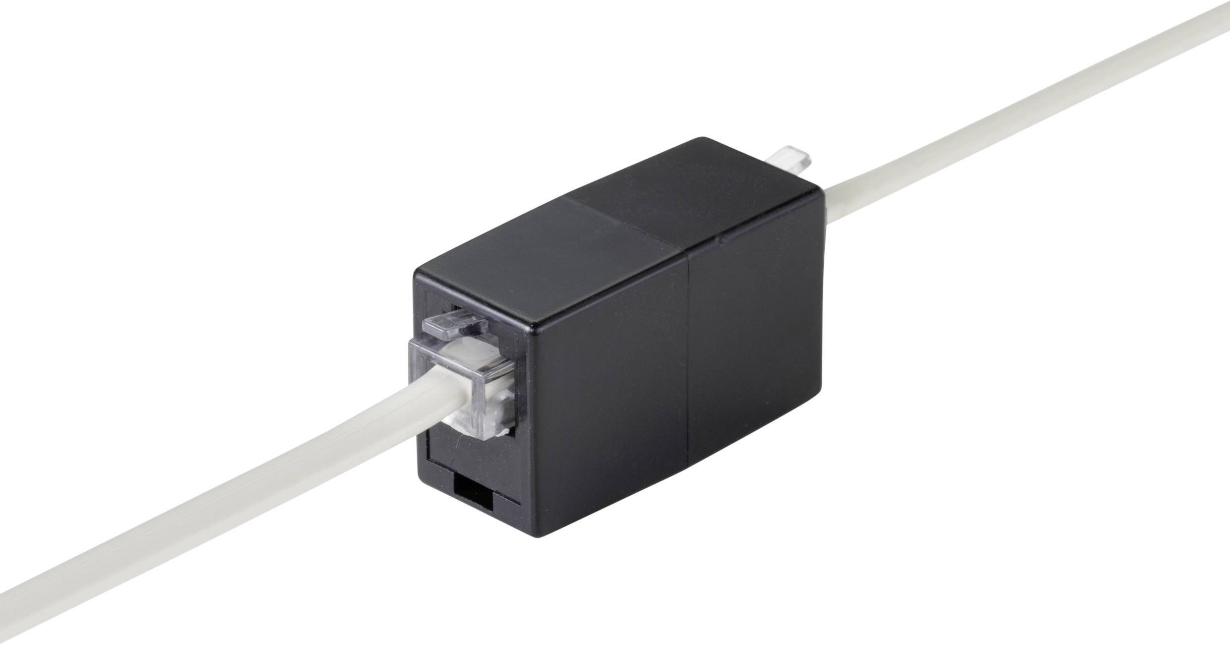 A black network plug connects two white cables that are routed through a rectangular, black adapter.