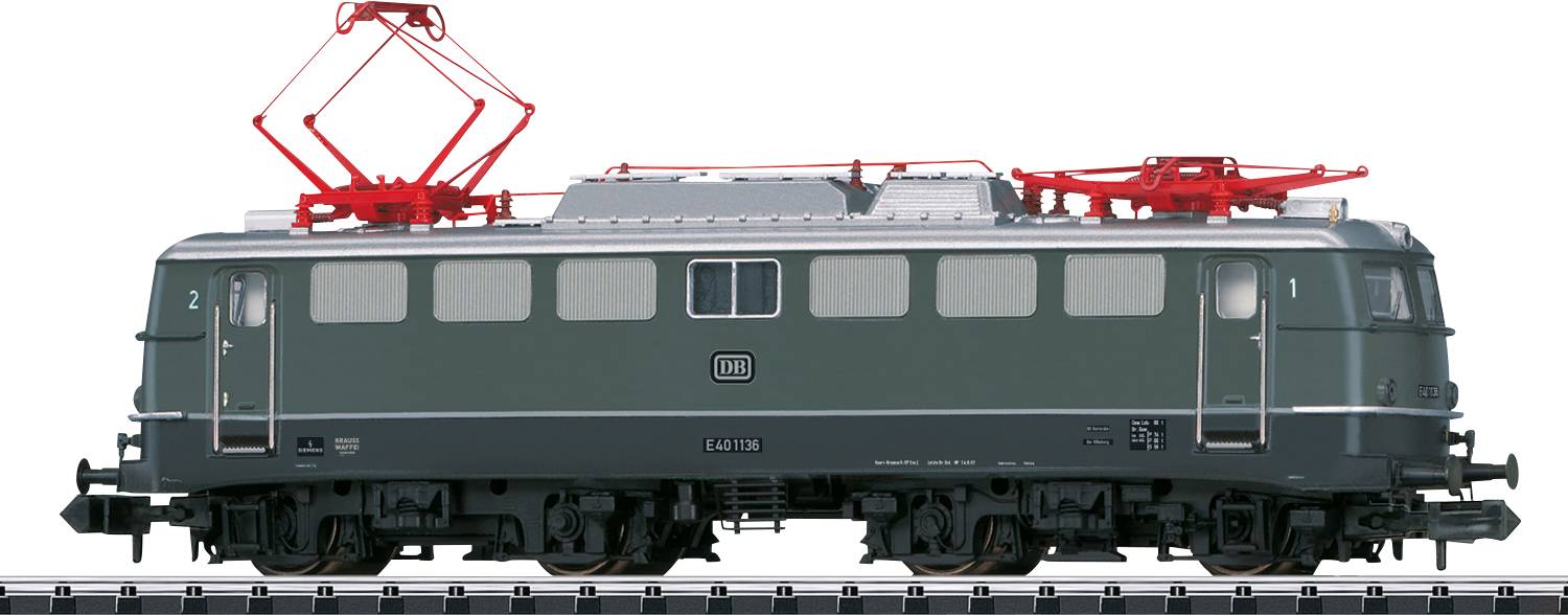 A green model locomotive of Deutsche Bahn on a track with a red pantograph.