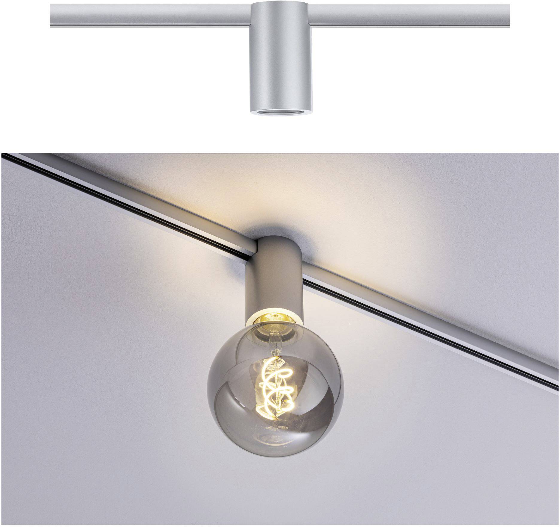 A round ceiling lamp made of metal with a visible, glowing filament in a clear light bulb, mounted on a rod.