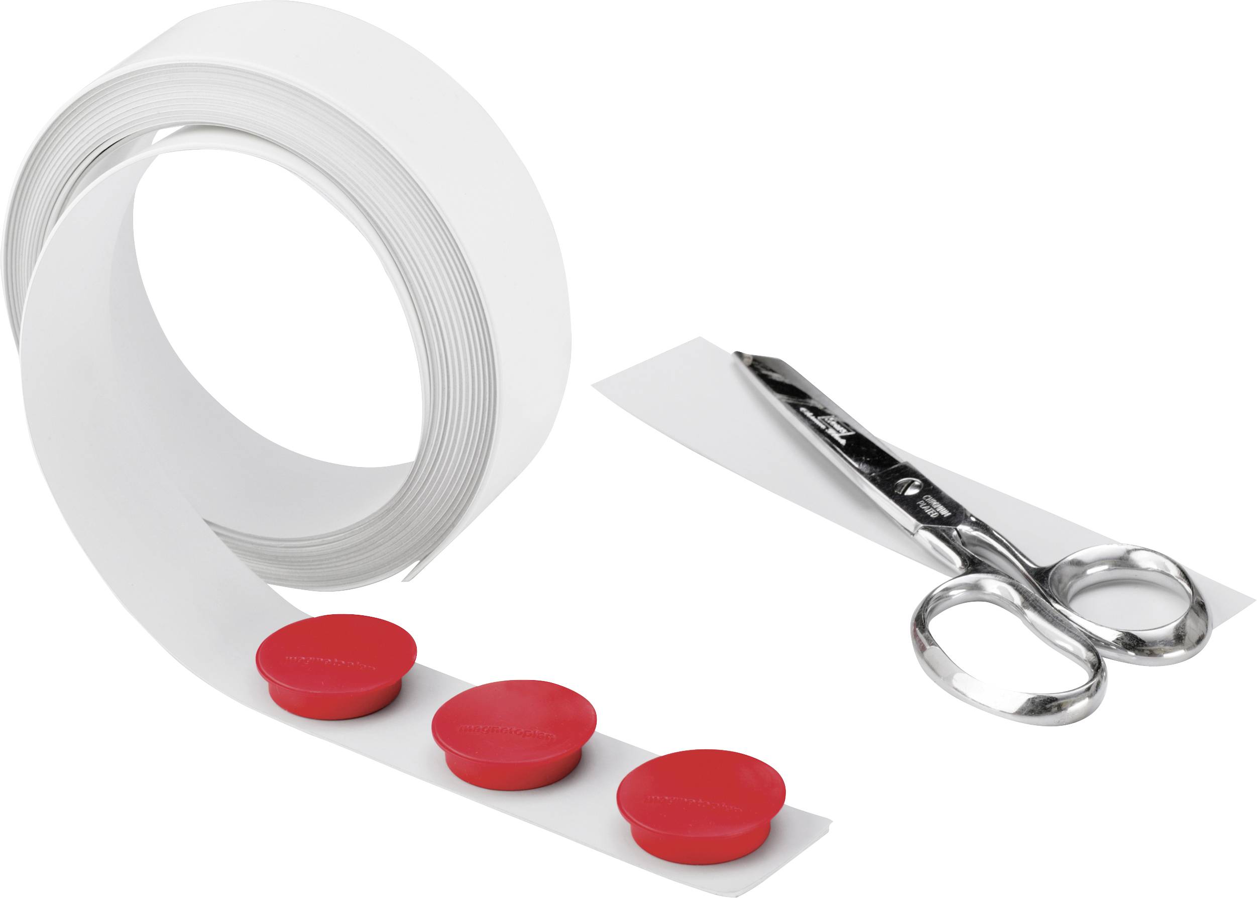 A pair of scissors next to a roll of white magnetic tape with three red magnets placed on it.