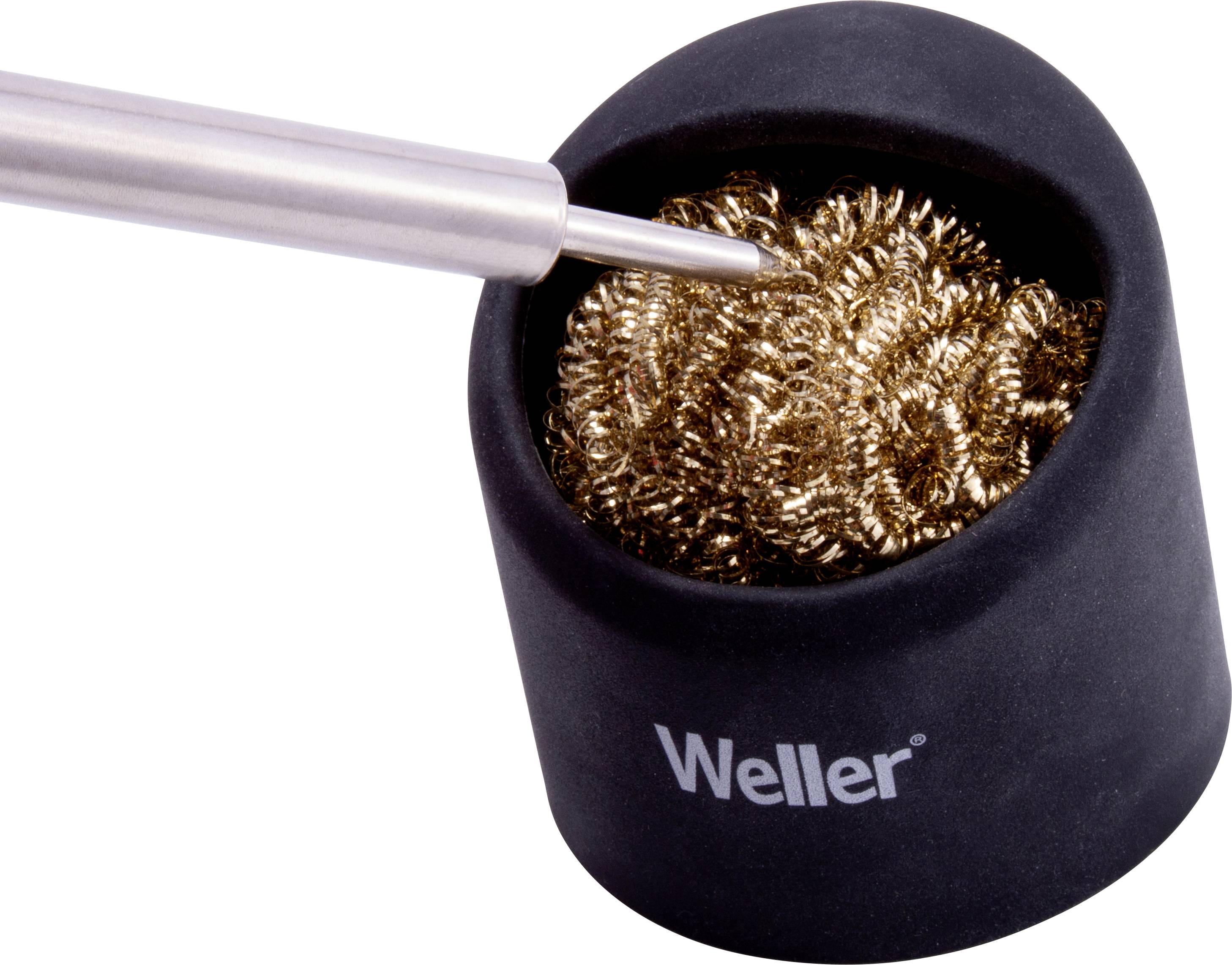Soldering iron in a stand with a metal sponge for cleaning the soldering tip, branded 'Weller'.