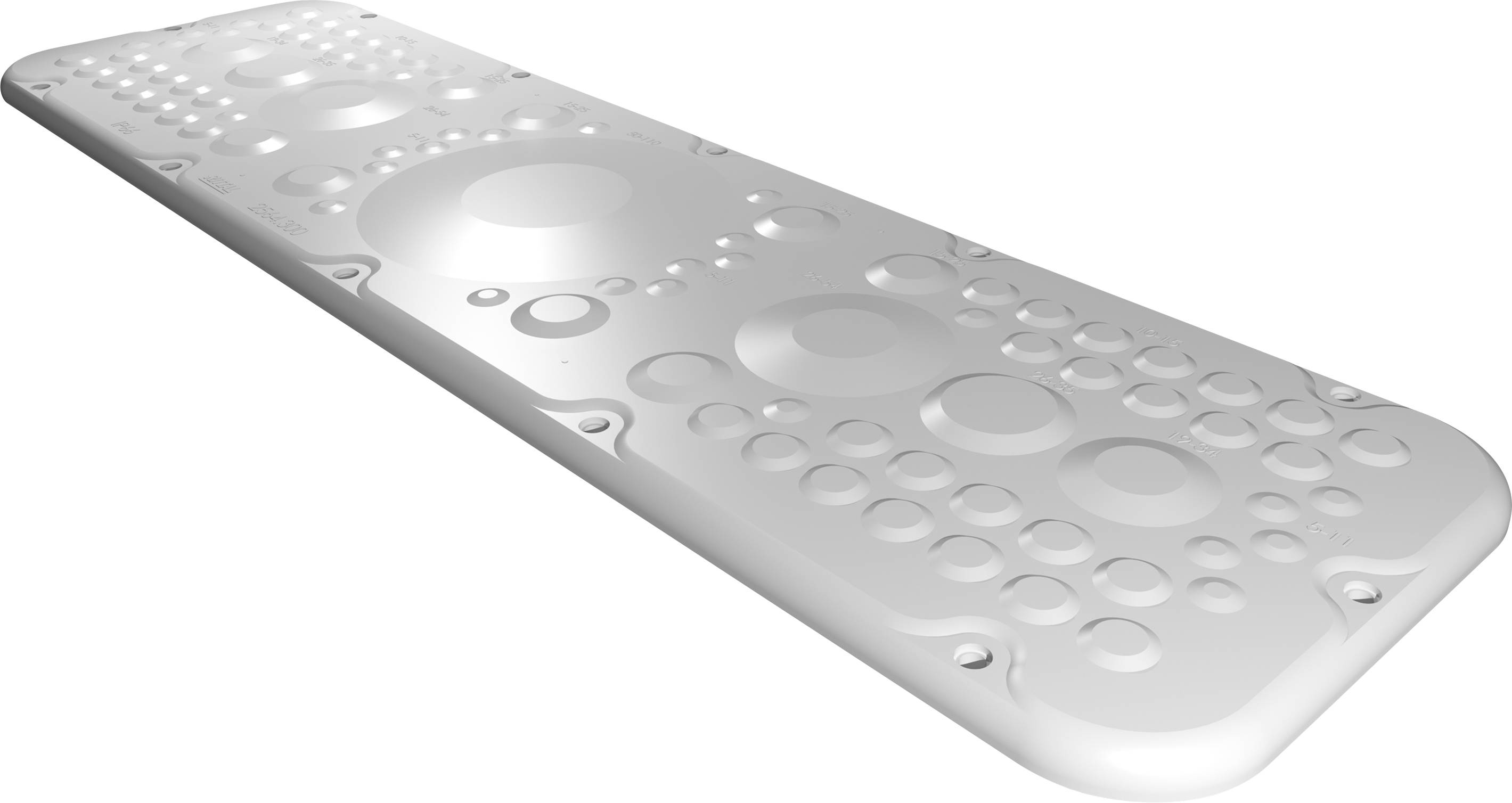 A rectangular, white board with raised circular patterns in various sizes.