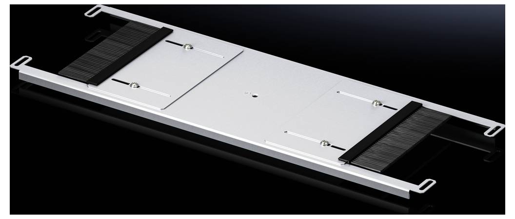 A flat, rectangular metallic device with black end pieces and a central hinge, set against a dark background.