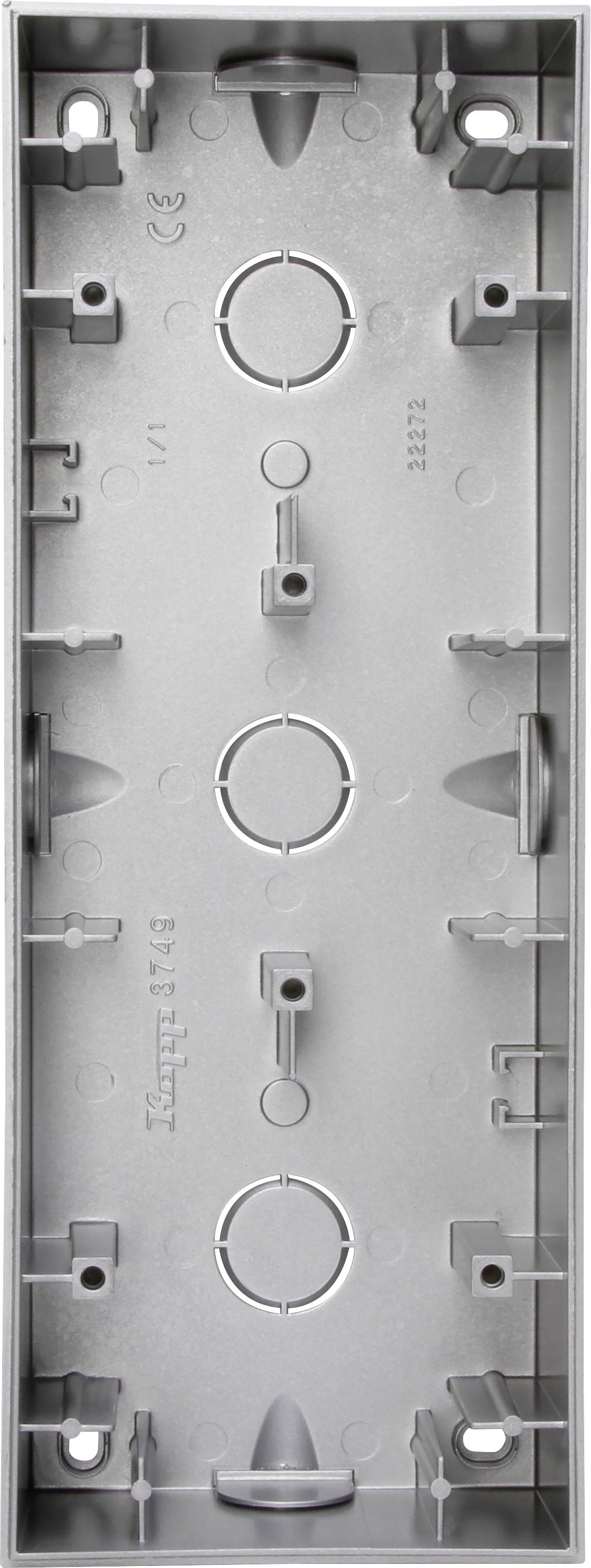 Rectangular metal box with multiple pre-drilled holes and mounting brackets; likely a mounting plate or electrical enclosure.