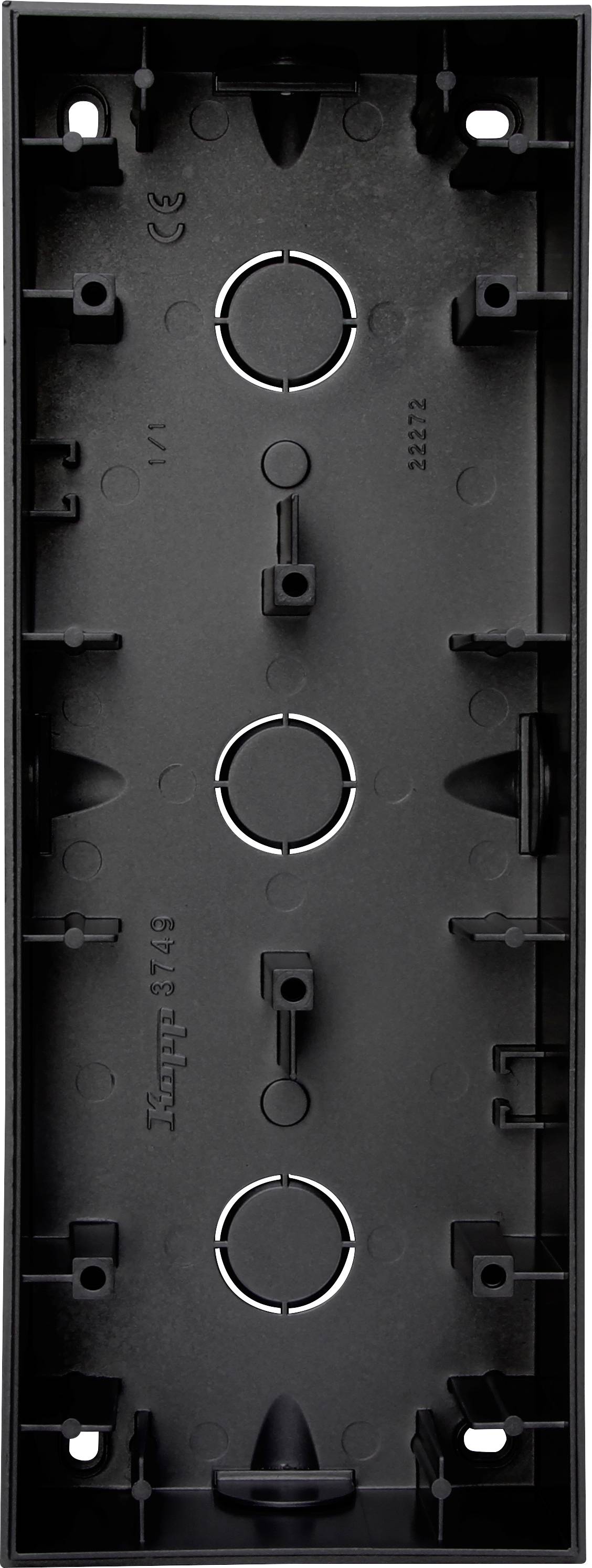 Black plastic enclosure in rectangular shape, with multiple round openings and mounting holes, for electrical installations.