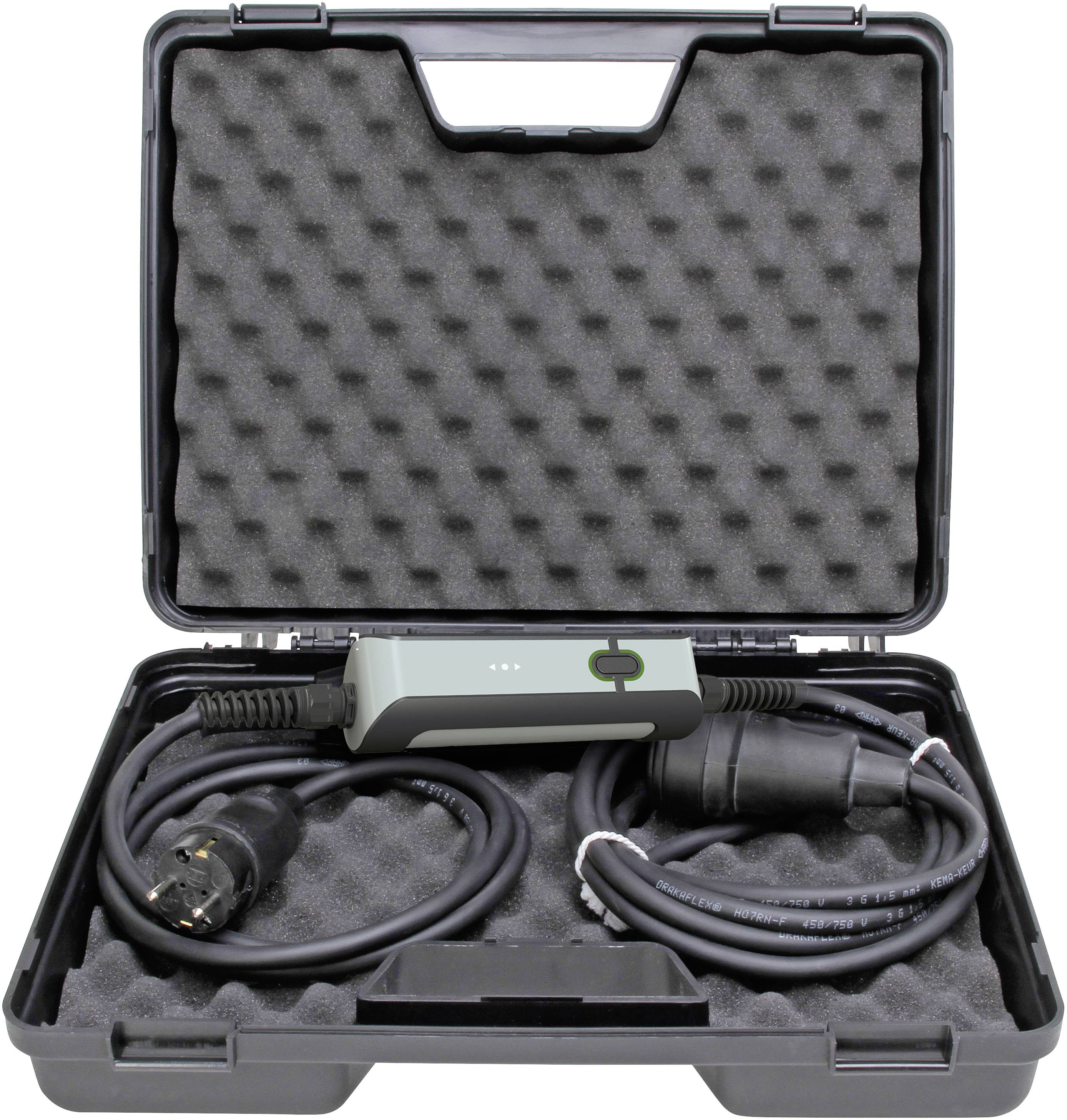 An open suitcase with foam lining contains a cable with a charger and plug, suitable for connection to a power source.