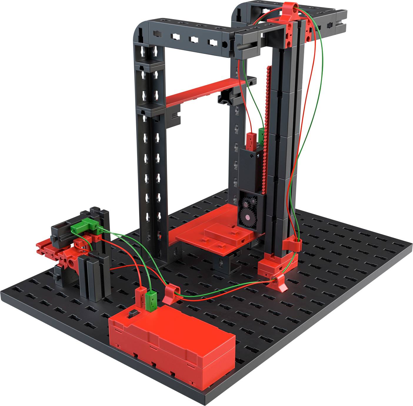 A modular kit of red and black building blocks demonstrates a mechanical model with rails and cables on a base plate.