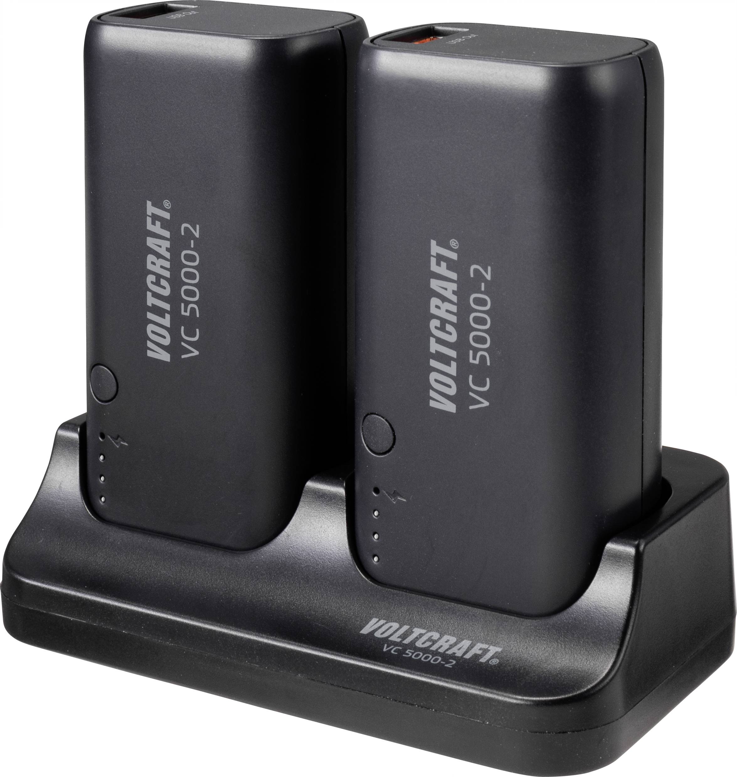 Two black batteries of the VOLTCRAFT VC 5000-2 model are standing side by side in a charging station.