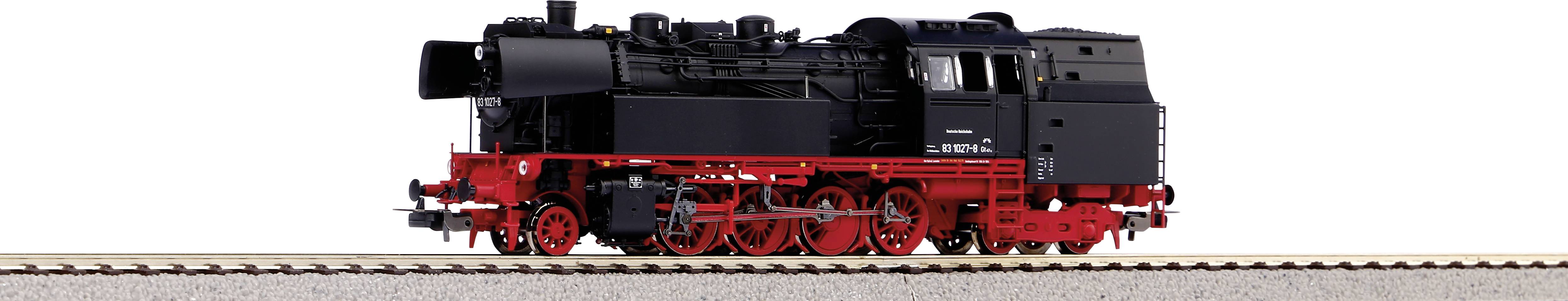 A model of a black steam locomotive on tracks. The locomotive has red wheels and a distinctive, detailed design.