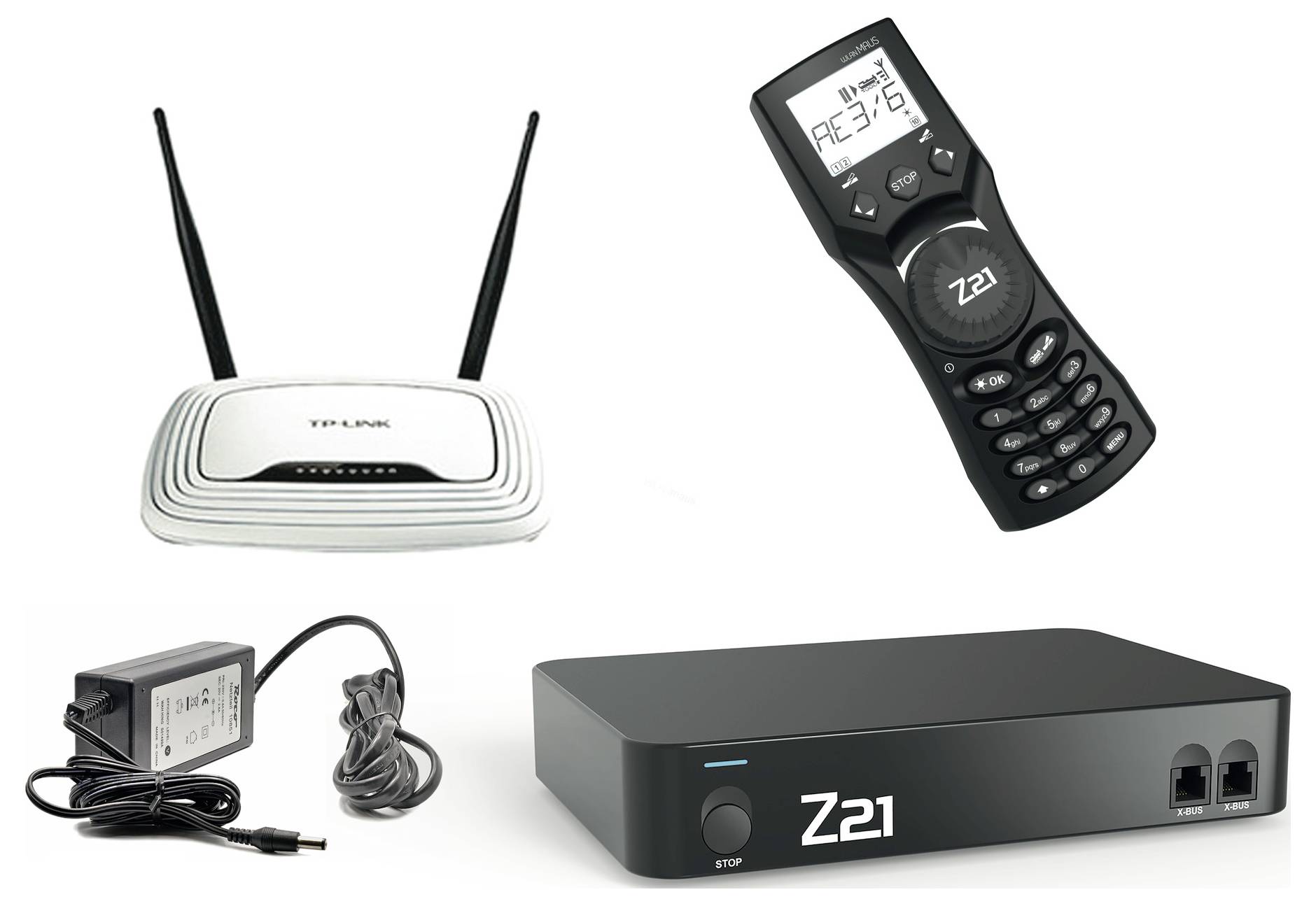 A network router, a black controller with a display, a power supply, and a Z21 control unit for model railways are shown.