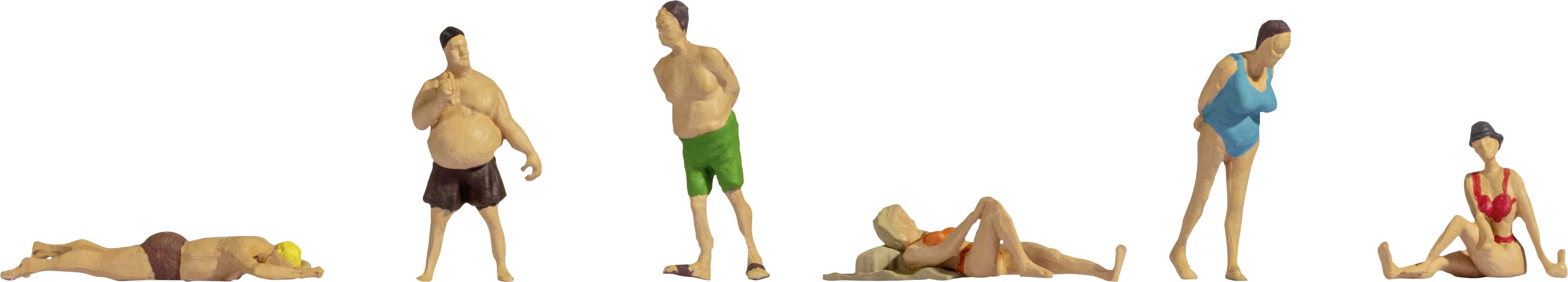 Several miniature figurines are wearing swimwear and posing in relaxed beach positions.