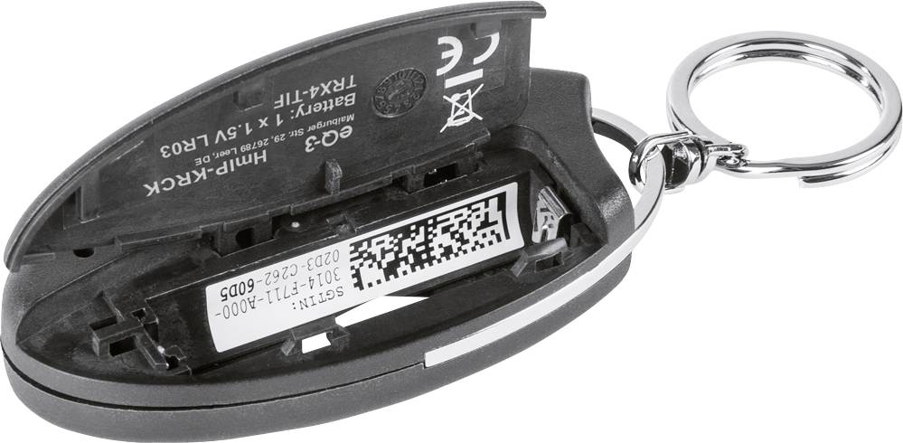 An open car key reveals the battery compartment with a visible battery and QR code inside, key fob visible on the right.