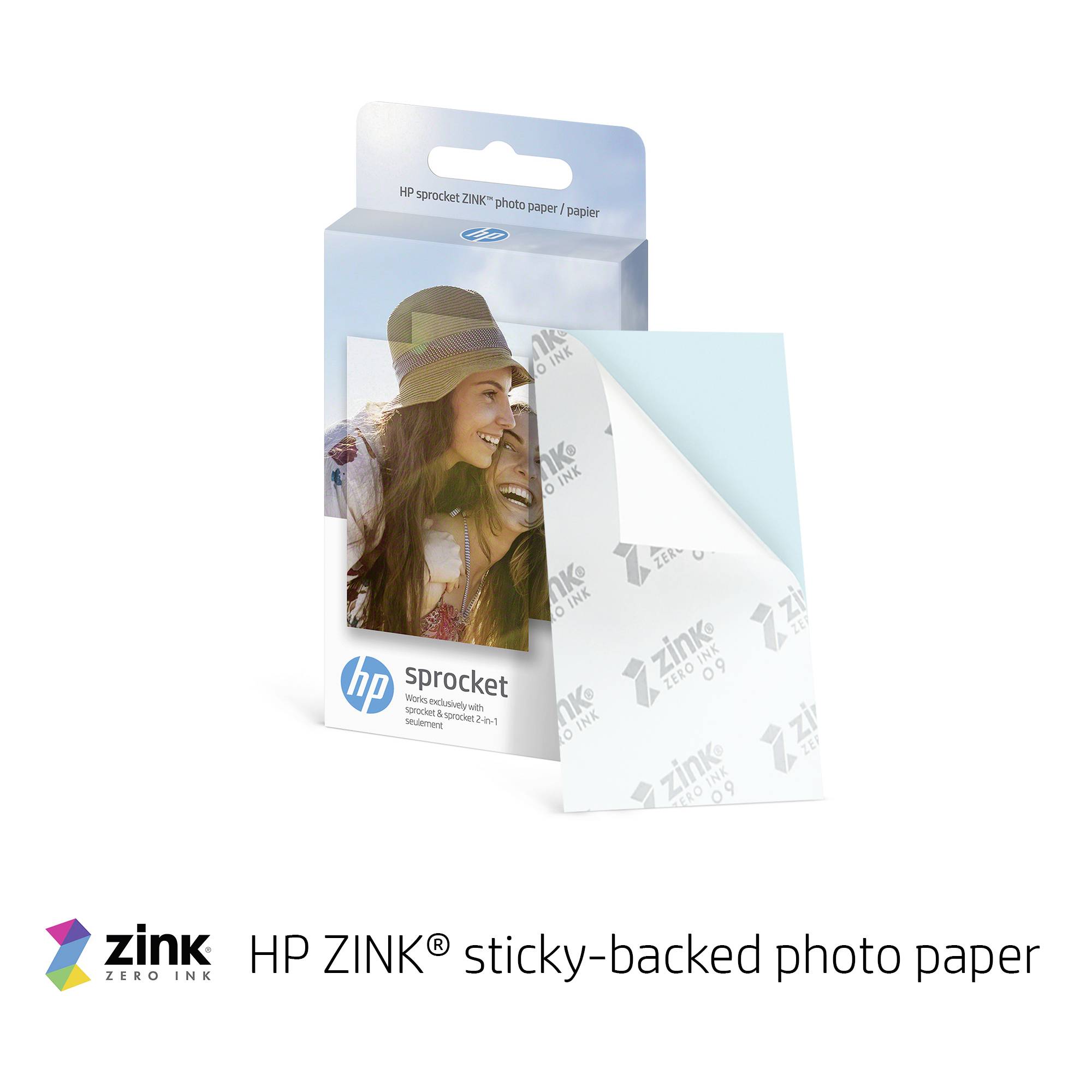 'HP ZINK® sticky-backed photo paper' pack with a photo showing two smiling people. Pack featuring the ZINK ZERO INK® logo.
