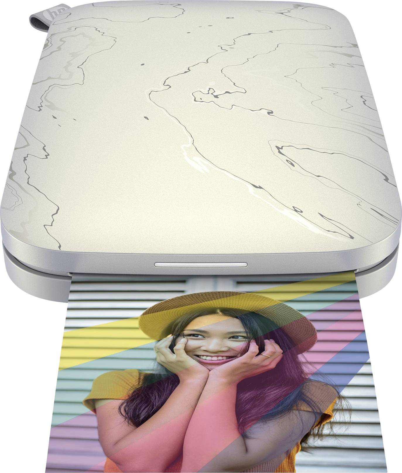 A portable photo printer is printing a colourful image of a smiling woman wearing a hat against a striped background.