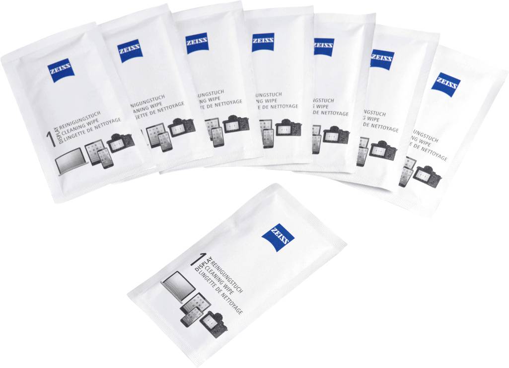 Nine individual cloths from the Zeiss brand for cleaning glasses and lenses are laid out fan-shaped next to each other.
