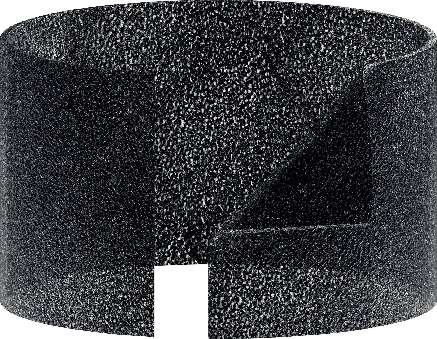 A black, roughly textured, ring-shaped structure with a rectangular cutout and an inner bevelled edge.