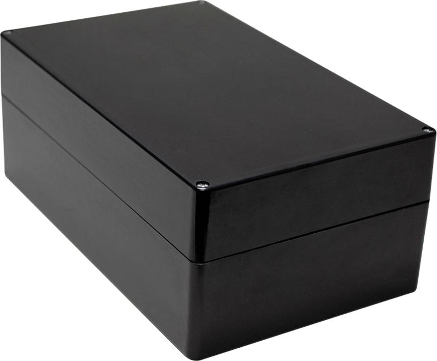 Black rectangular box with visible screws at the corners, standing on a neutral surface.