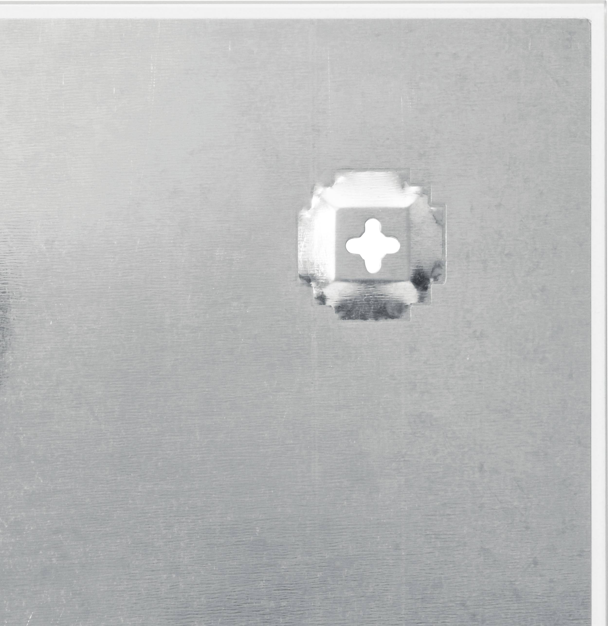 Metal plate with a square hole and a screw nut, positioned centrally, resembling a cross.