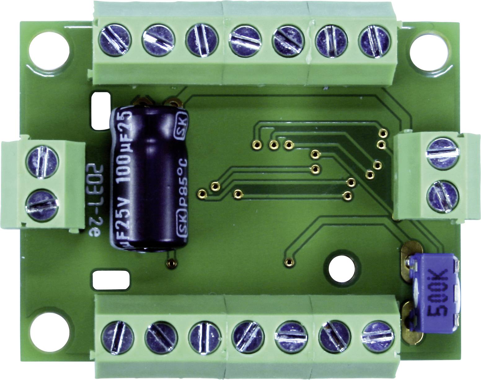 Circuit board with green connecting terminals, a black capacitor, and a blue component. Suitable for electronic circuits.