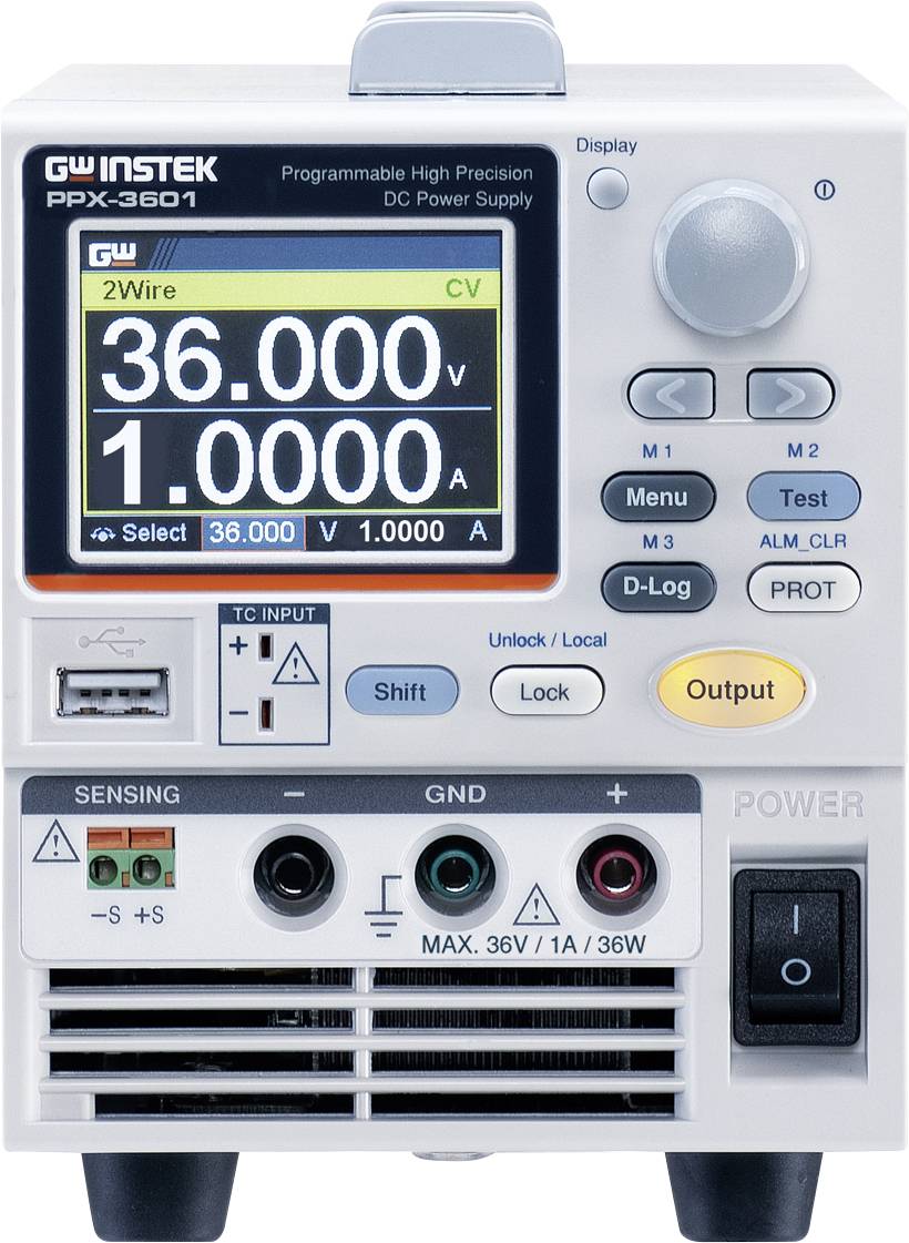 A programmable precision DC power supply with a display shows '36.000V' and '1.0000A'. Several adjustment knobs and connectors are visible.
