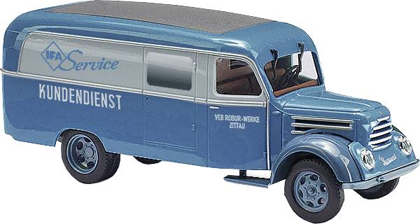 Historic blue IFA customer service delivery van with the inscription 'Service', standing on a white background.