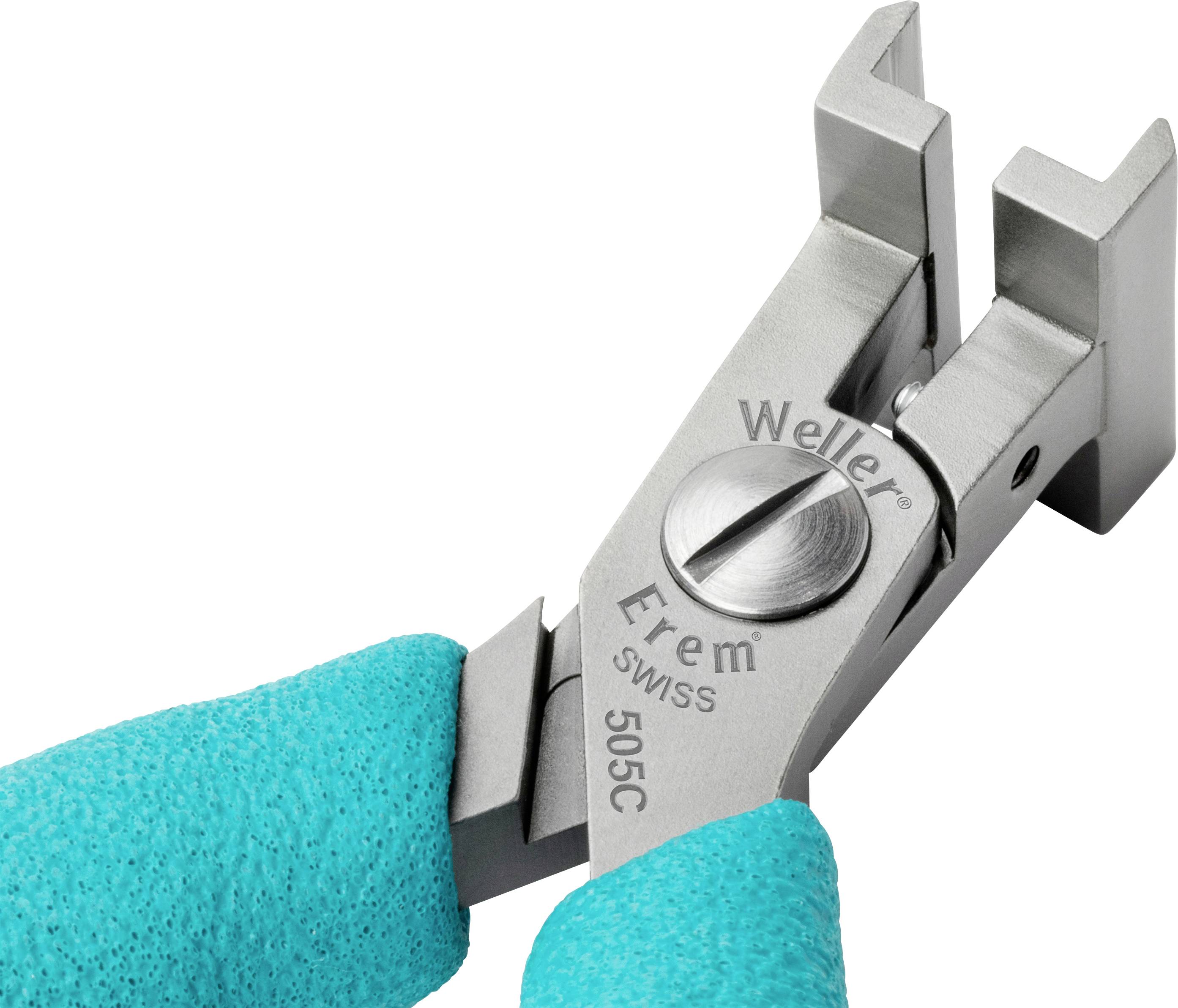 Close-up of a precise side cutters in turquoise gloves, with the inscription 'Weller Erem 505C Swiss'.