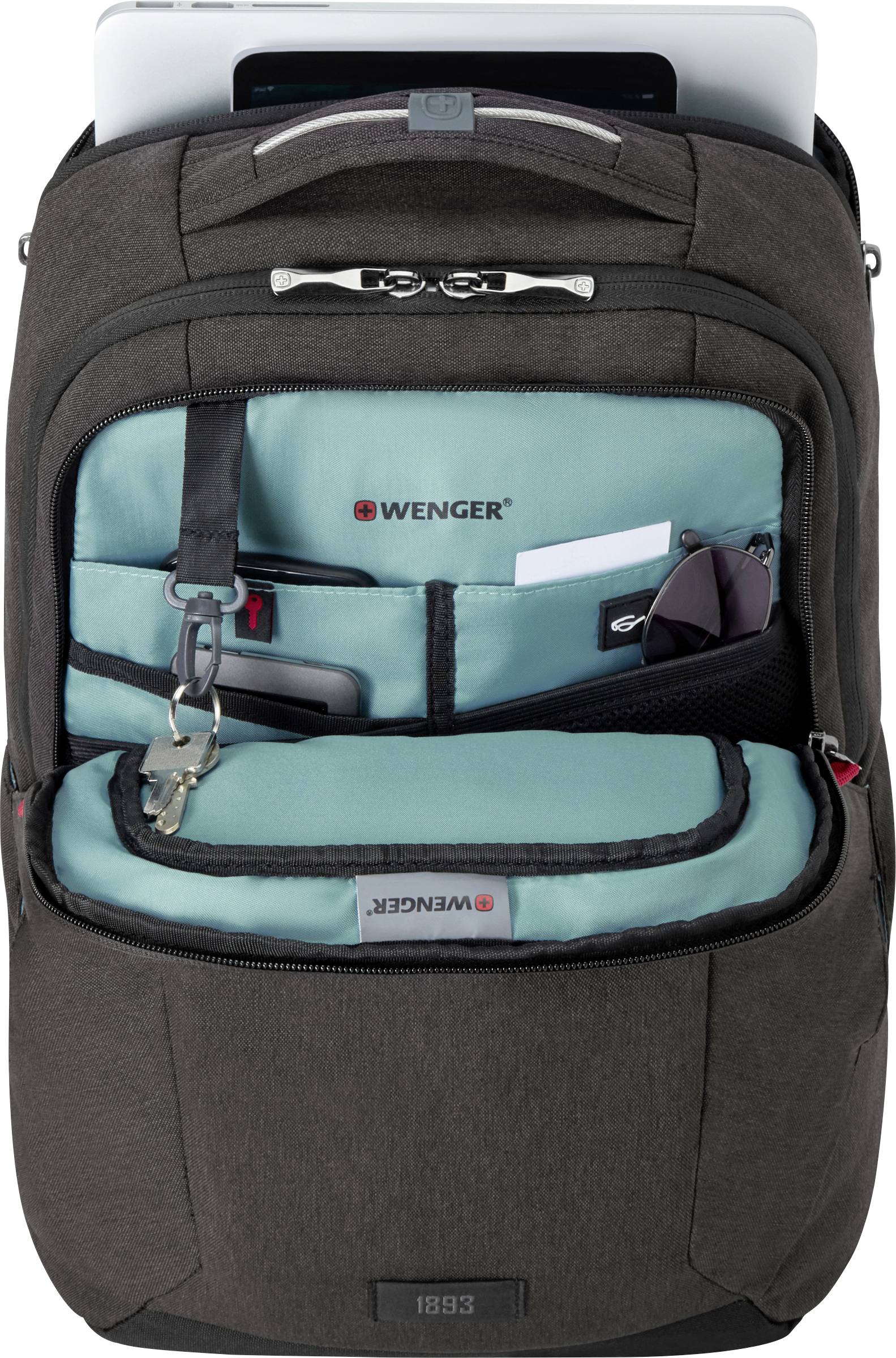 A dark grey rucksack with several greenish-blue compartments, zipped pockets, and an organised interior. Suitable for laptops.