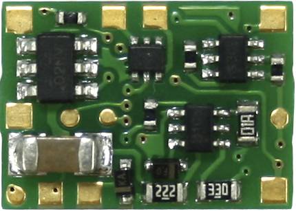 A green printed circuit board with multiple chips, resistors, and solder points. It is likely used for an electronic circuit.