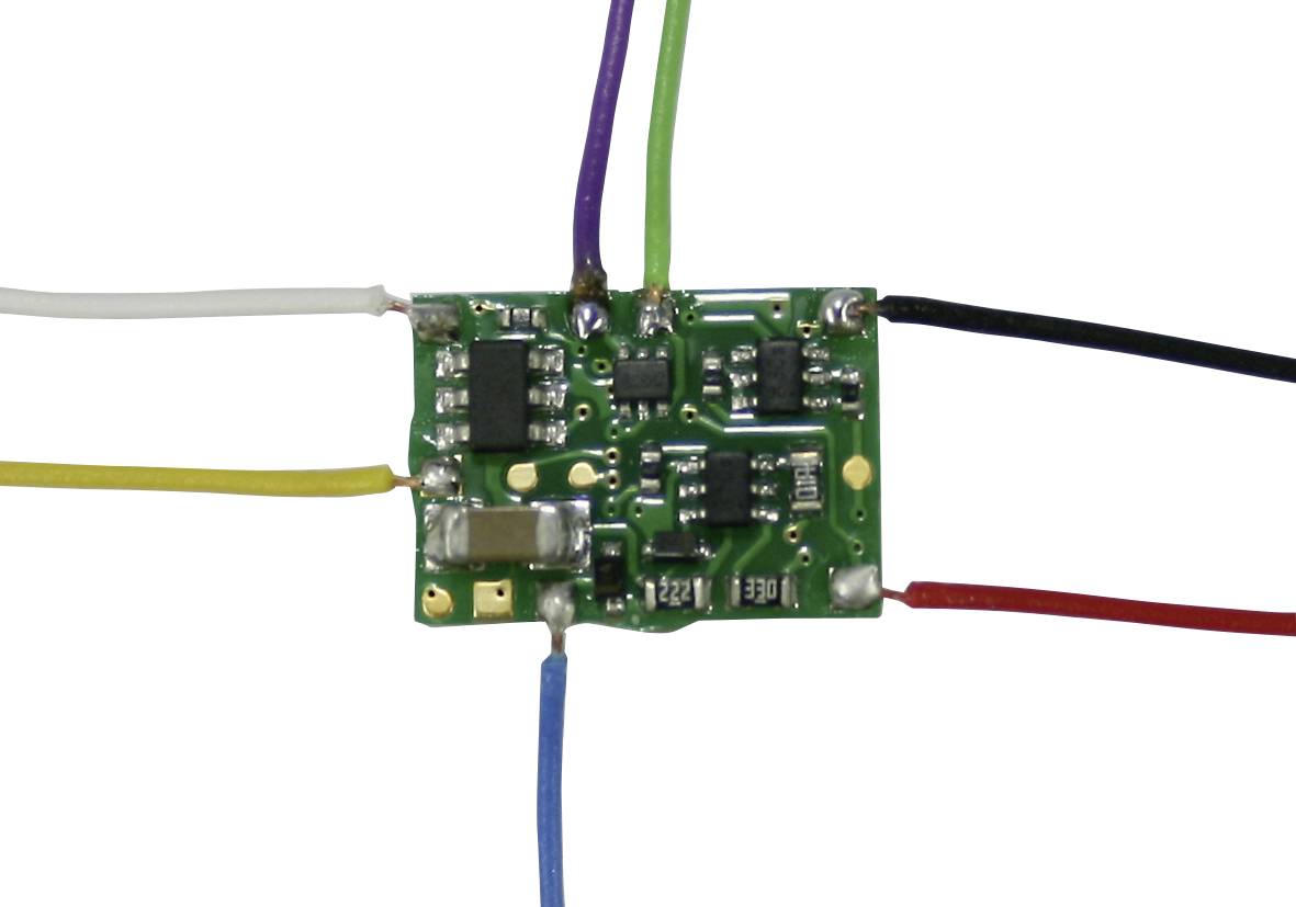 A small green circuit board with various connected coloured wires: white, yellow, blue, red, black and purple.