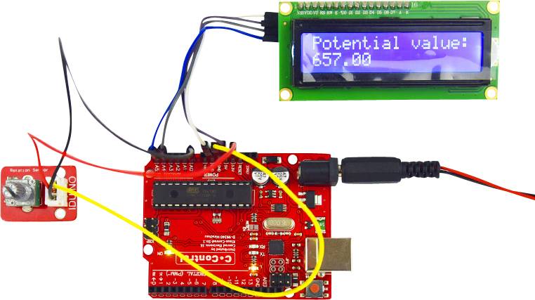 An Arduino board is connected to a sensor and an LCD display. The display shows the text 'Potential value: 657.00'.