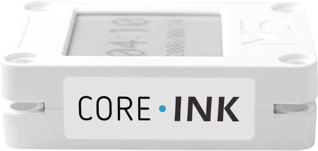 A small rectangular electronic screen in a white housing, labelled 'CORE INK', displays information.